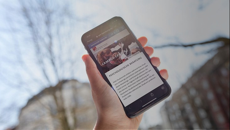 Hand holding smartphone